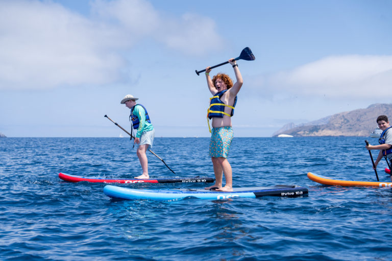 Paddleboarding on the ocean near Catalina Island brings joy to campers!