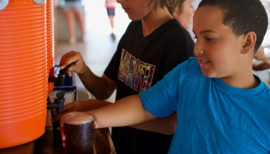 campers getting soda at the fountain